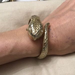 Gold snake watch